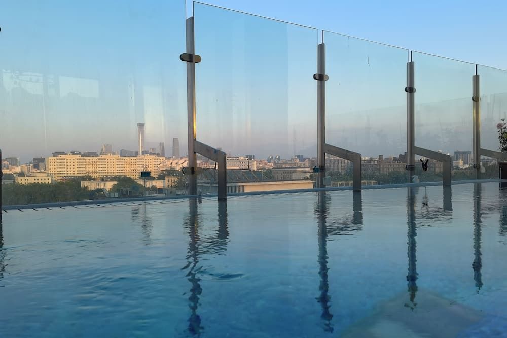 Purple Horse Hotel &beijing Hutong Designer Boutique Garden Hotel&french Window&close To The Forbidden City&tian'anmen&wangfujing&nanluogu Lane&lama Temple&360-Degree Viewing Terrace Bar&roof Swimming Pool&private Bathtub&laundry&gym&family Suite