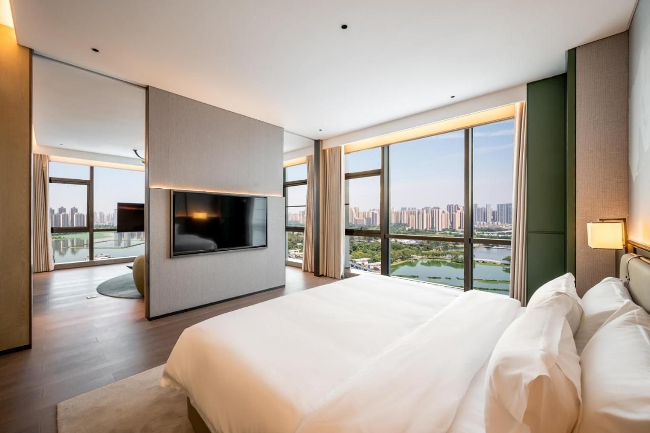 Qinglian Jinghe Hotel Wuhan Zoo International Expo Center Branch