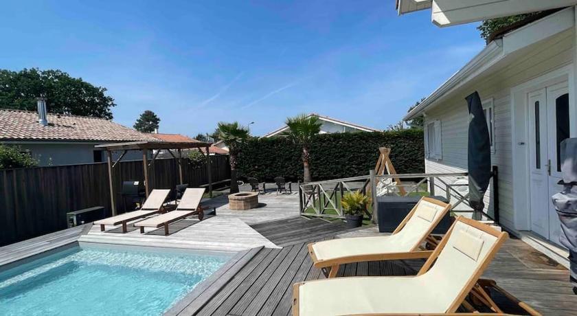 Villa de Cazaux, piscine chauffée pétanque billard Aquitaine - La Teste-de-Buch visuel 4/5 Villa de Cazaux, piscine chauffée pétanque billard Aquitaine - La Teste-de-Buch visuel 4/5