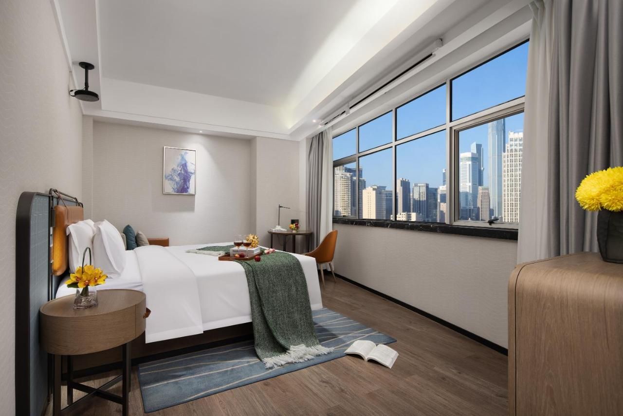 Anya Hotel -Next to Jiefang West Bar Street 2 minutes to the subway station free coffee free laundry free gym, huge windows