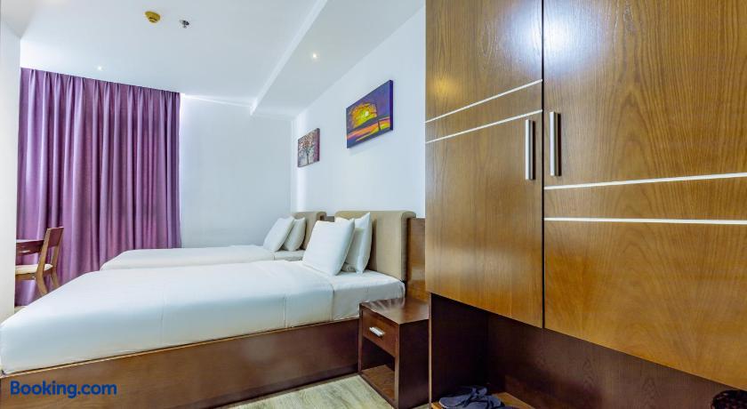 booking-1070875012-528065256-445828 Golden Sun Apartment by New Sky Travel