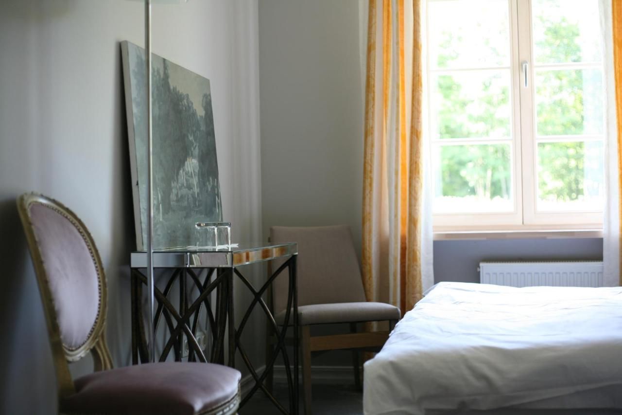 Lake & Library boutique Hotel