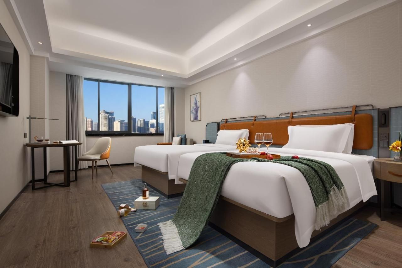 Anya Hotel -Next to Jiefang West Bar Street 2 minutes to the subway station free coffee free laundry free gym, huge windows