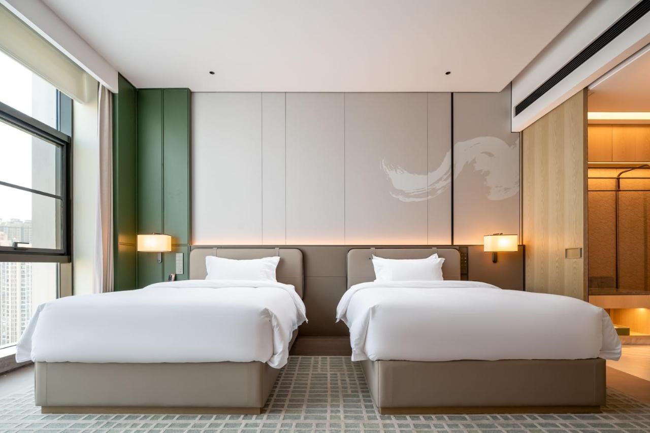 Qinglian Jinghe Hotel Wuhan Zoo International Expo Center Branch