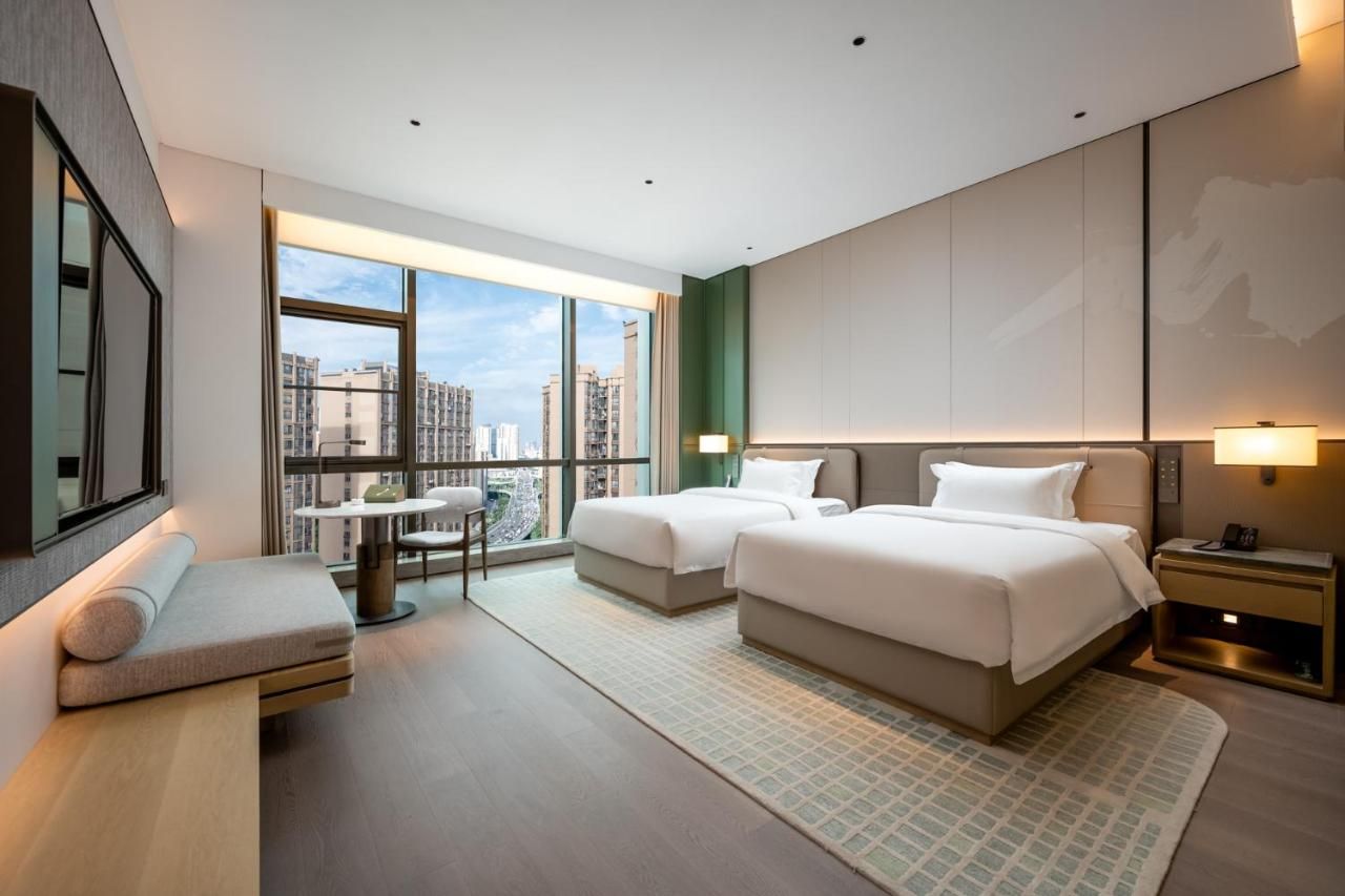 Qinglian Jinghe Hotel Wuhan Zoo International Expo Center Branch