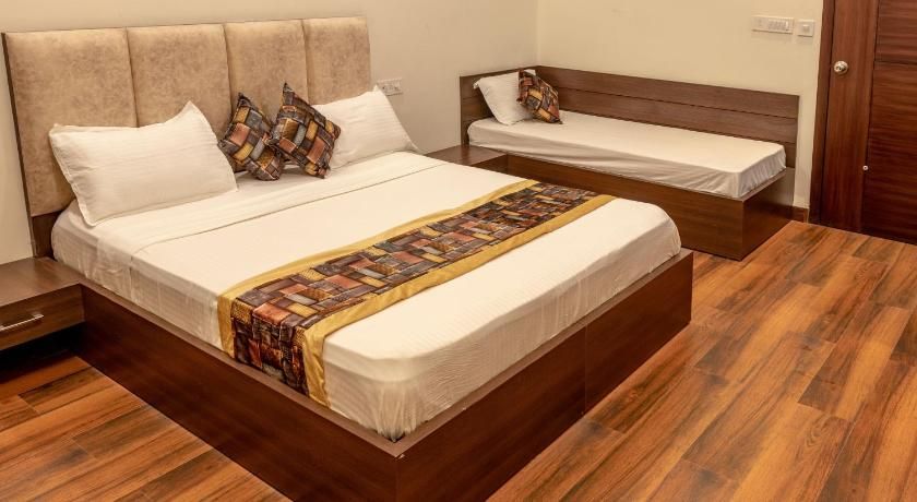 De Manora Homes - Unpretentious hotel with a garden , posh area Ranjit Avenue