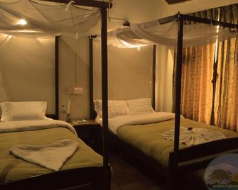 River View Jungle Camp - Sauraha - Schlafzimmer