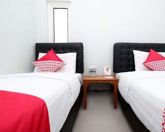 Hotel O Palebon Residence - Semarang - Bedroom