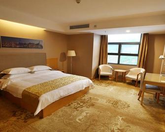 Chian Century Hotel - Shiyan - Camera da letto