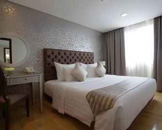 Mg Suites Hotel Semarang - Semarang - Bedroom