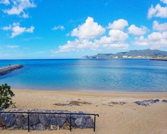 Kariyushi Condominium Resort Nago Sea Side House - Nago - Ranta