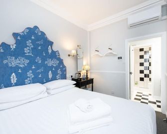 Americana Hotel - London - Bedroom