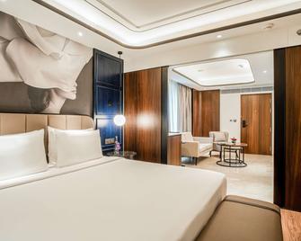 Radisson Blu Hotel Ahmedabad - אחמדאבאד - חדר שינה