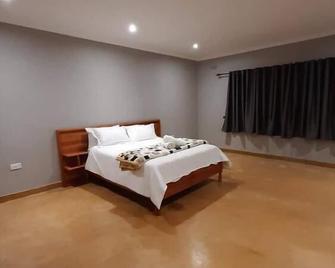 Buffalo Ridge Lodge and the Beauty of Nyanga. Perfect Combination - Nyanga - Bedroom