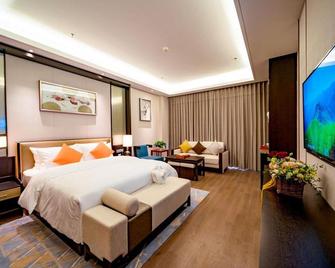 Yixing Hotel - Wuxi - Bedroom