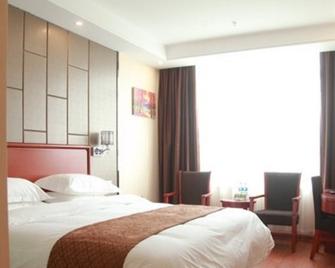 Greentree Inn Anhui Bozhou Xiyi Avenue Beichen Business Hotel - Bozhou - Спальня
