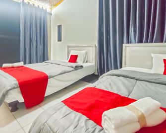 RedDoorz Syariah @ Oemah 85 Purwokerto - Purwokerto - Bedroom