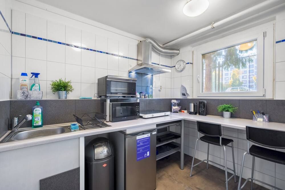 Kitchen view of A&O Dresden Hauptbahnhof