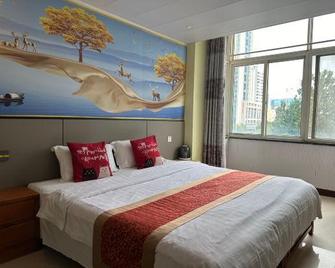 Lijiang Hotel (Xinyi Railway Station) - Suqian - Bedroom