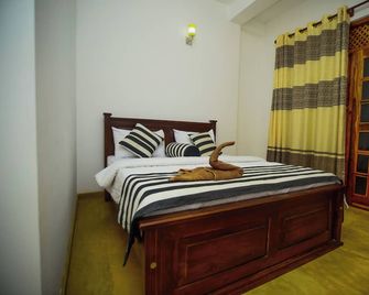 Dinaro Guest - Ella - Bedroom
