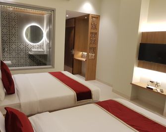 Vishnu Executive Rooms - Virār - Bedroom