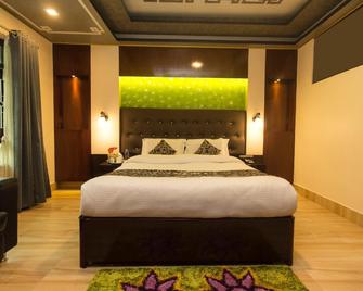 Capital O 2900 Hotel Rama Residency - Ānand - Habitación