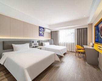 Huarui Grand Hotel (Wanlongcheng, Heyuan) - Heyuan - Bedroom