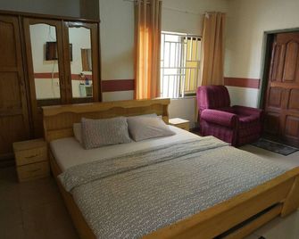 Good Morning Guest House - Kumasi - Schlafzimmer