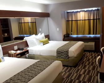 Microtel Inn & Suites by Wyndham Bellevue/Omaha - Bellevue - Bedroom