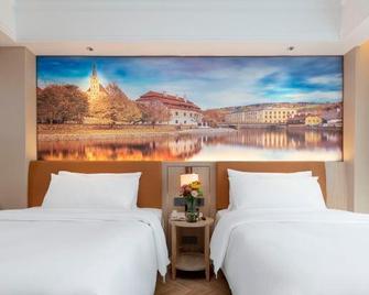 Vienna Hotel lishui Longquan - Lishui - Slaapkamer