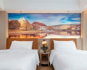 Vienna Hotel lishui Longquan - Lishui - Bedroom