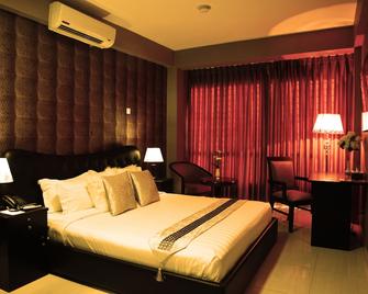 Civic Inn - Дакка - Спальня