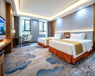 Guiyang Xiuwen Century Yihe Hotel - Guiyang - Habitación