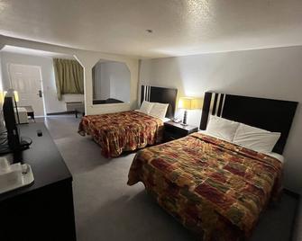 Atria Inn & Suites - San Antonio - Bedroom