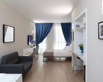 Alma Suites - Neapel - Schlafzimmer
