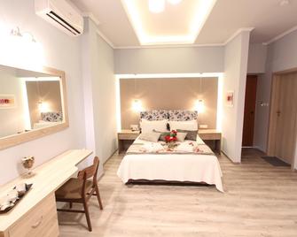 Hotel Mallas - Nea Kallikratia - Slaapkamer