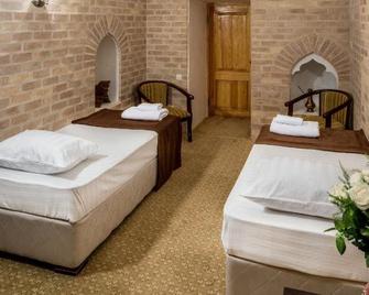 Orient Star Khiva Hotel- Madrasah Muhammad Aminkhan 1855 - Xiva - Schlafzimmer