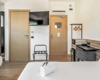 B&b Hotel Prato City Center - Прато - Спальня