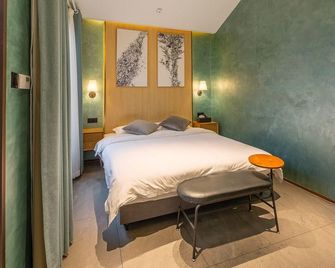 West Lake Begonia Art Homestay - Hangzhou - Sypialnia