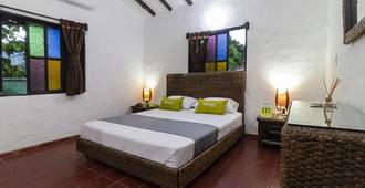 Hacienda Real - فيلافيسنسو - غرفة نوم