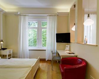 Car By Side - Boardinghouse Heidelberg - Heidelberg - Bedroom