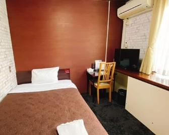 Hotel Select Inn Tsuyama - Tsuyama - Camera da letto