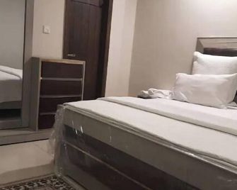 Pine Apartments Civic center bahria town Islamabad - Rawalpindi - Bedroom