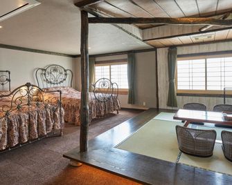 Niseko Annupuri Onsen Yugokorotei - ניסקו - חדר שינה
