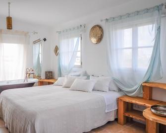 Uma Casa a Beira Sol - Lagos - Habitación