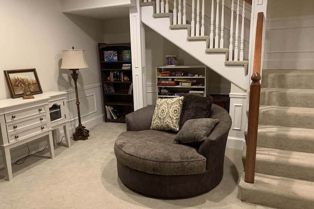 Living room view of Completely restored 1885 Queen Ann style home located next to the temple lot