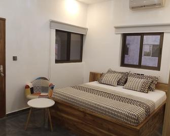 Marys Guest House - Lomé - Habitación