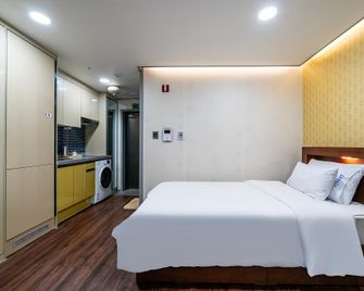 Seosan Daesan Hub Hotel - Seosan - Habitación