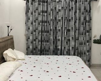 This property is located 15mins from the port harcourt international airport. - Port Harcourt - Dormitor