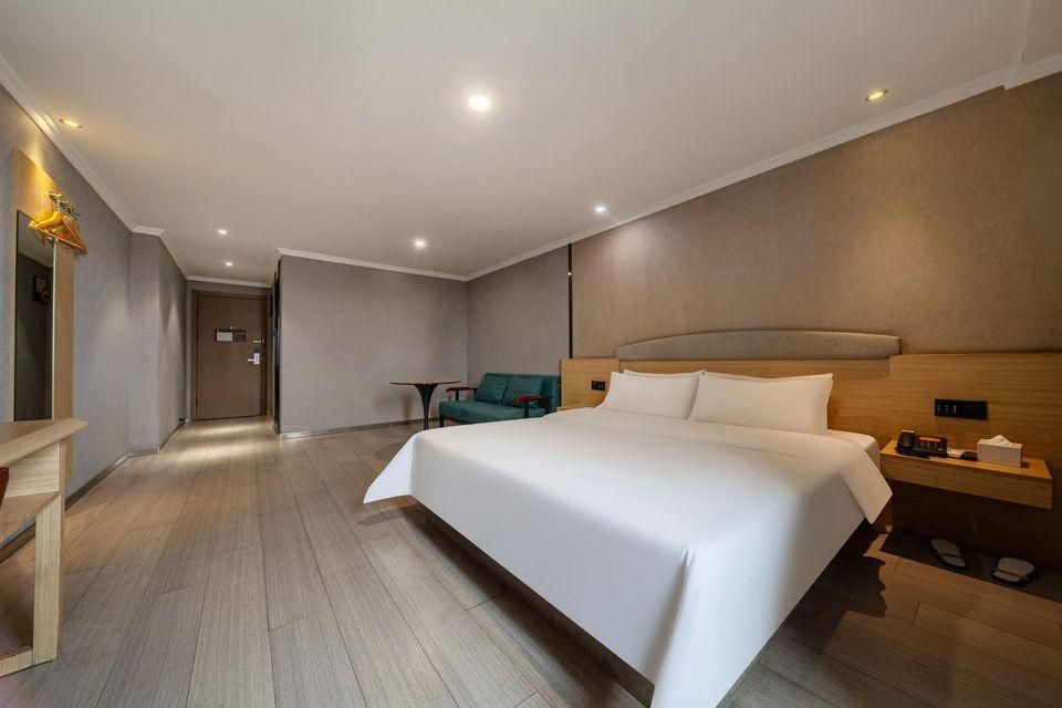 7 Days Premium Hotel (Nanchang Fuzhou Road Metro Station) - נאנצ'אנג - חדר שינה